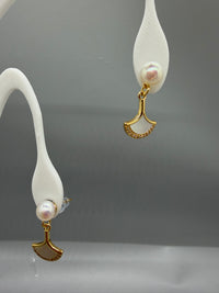 Freshwater pearl dangle earrings with gold ginkgo leaf charms