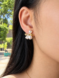 Gold plated mother of pearl bow stud earrings with freshwater pearl drops
