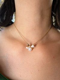 Bow pearl necklace with mother of pearl bow pendant and freshwater pearl drop on gold plated chain