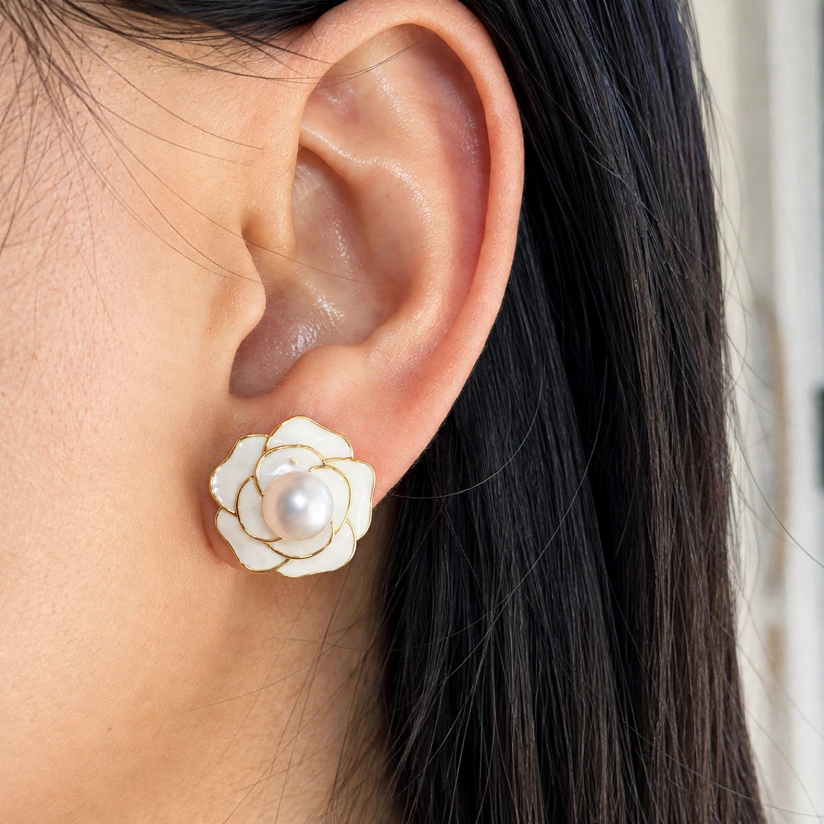 Gold plated white camellia flower stud earrings with freshwater pearl centers