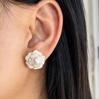Gold plated white camellia flower stud earrings with freshwater pearl centers