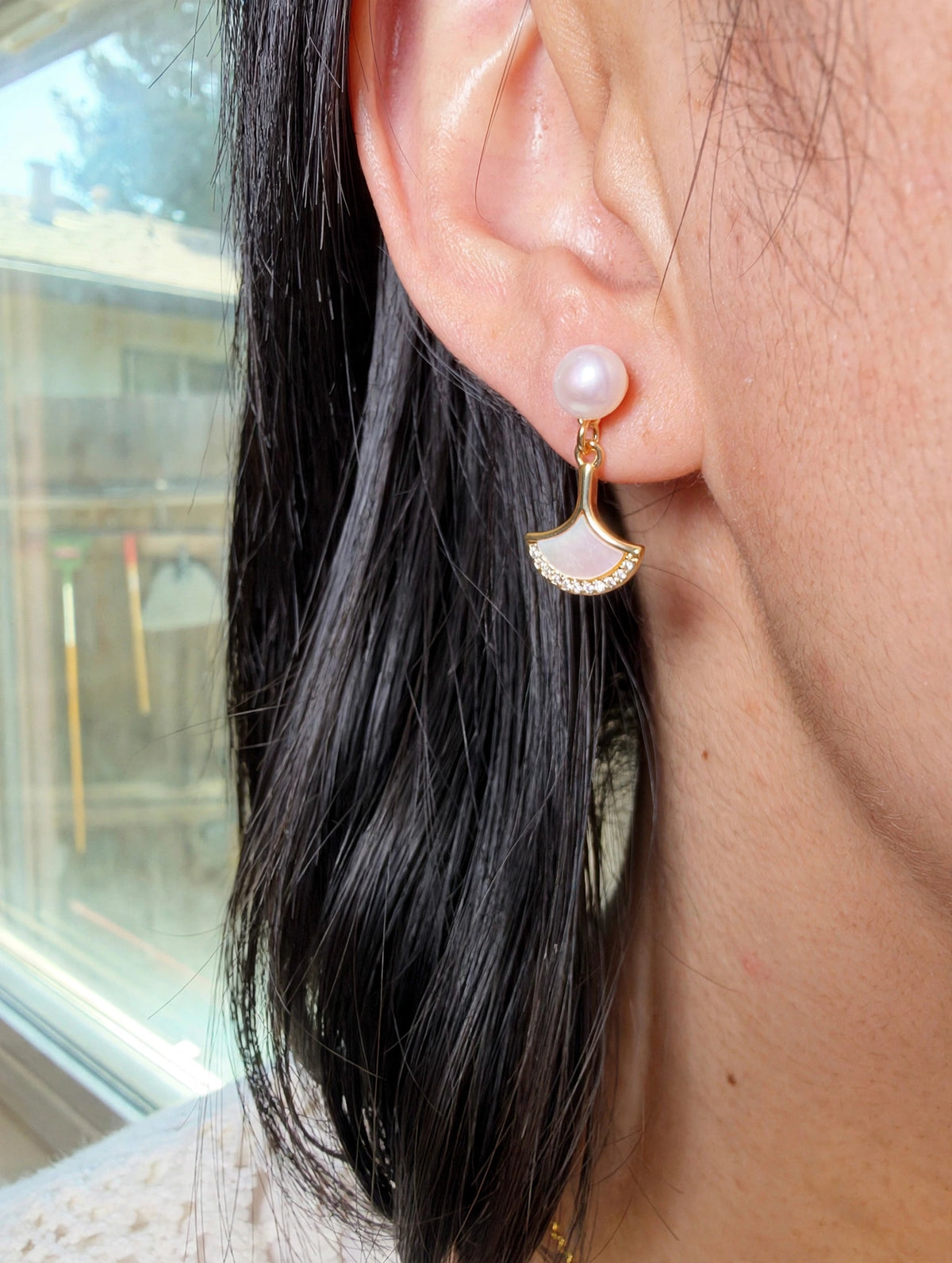 Gold plated ginkgo leaf earrings with mother of pearl inlay and freshwater pearl accents