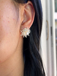 Gold plated sunburst stud earrings with freshwater pearl center